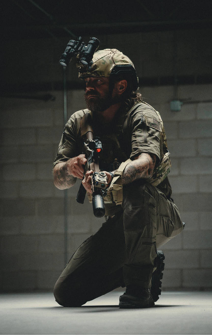 Soldier with Rifle and HUXWRX Suppressor